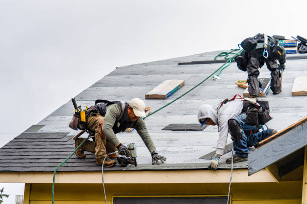 Professional Gutter Installation technician working in Newfield, NY